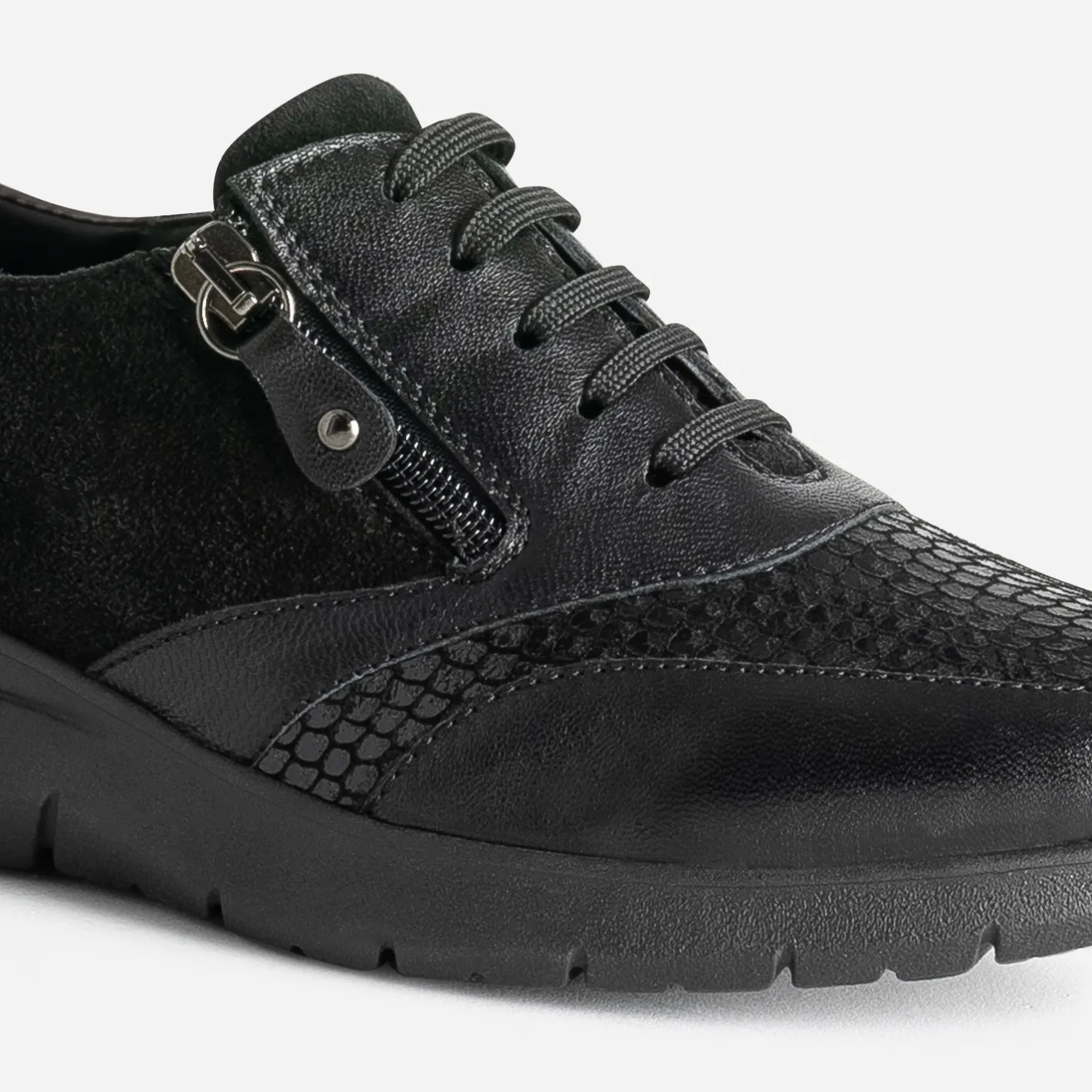 Tennis e en cuir^FRANCE ARNO New